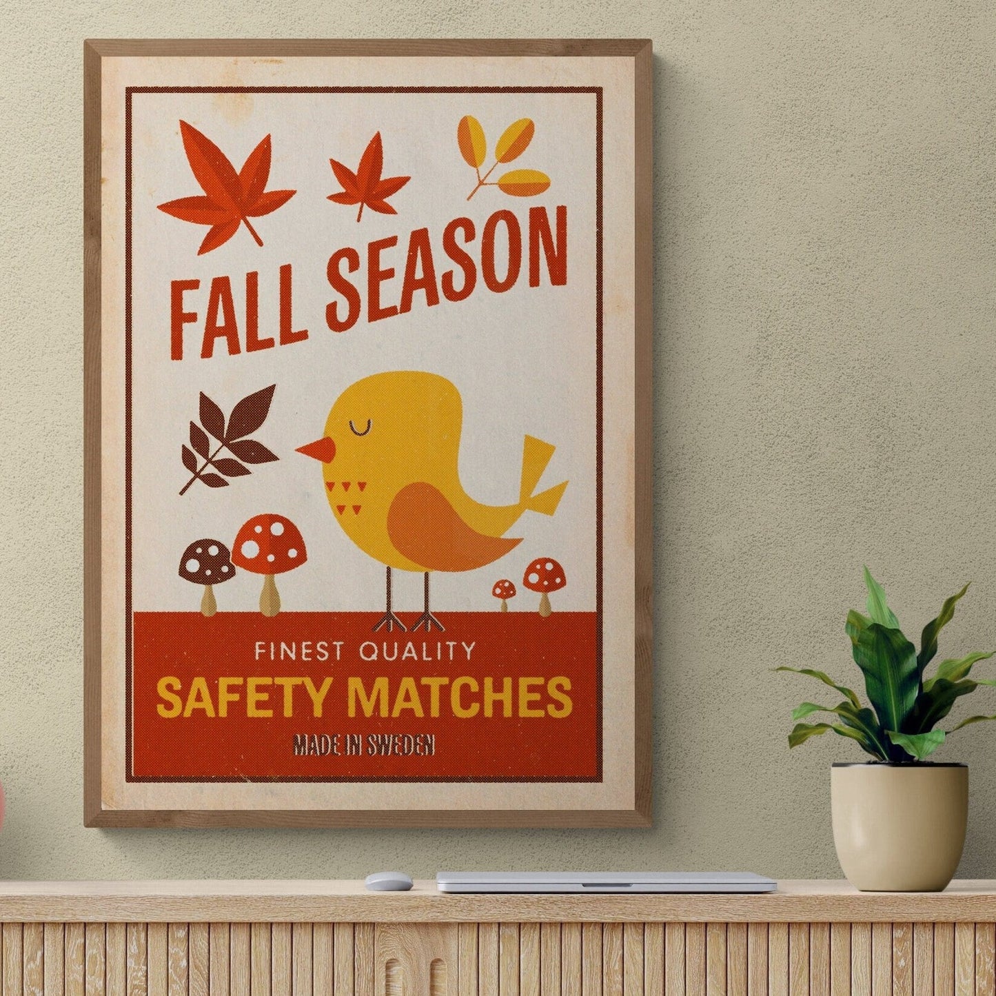 A cute retro style print featuring a bird with mushrooms and leaves in autumnal or fall colours